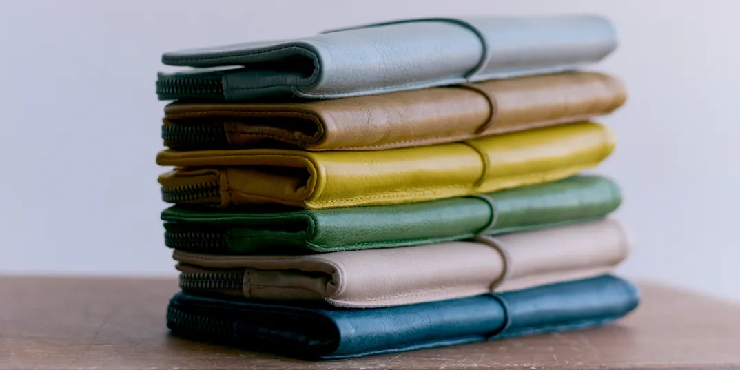 A stack of Latico leather wallets in many colors, from the Latico home page.