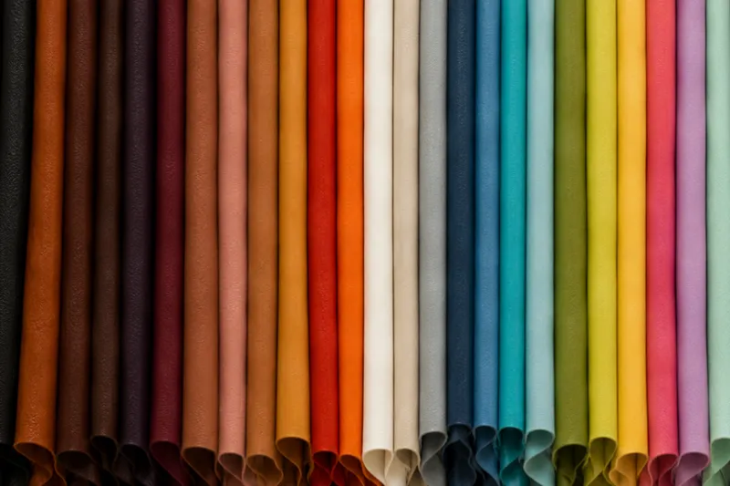 Hanging hides of full-grain leather in dozens of colors, from the Latico home page.